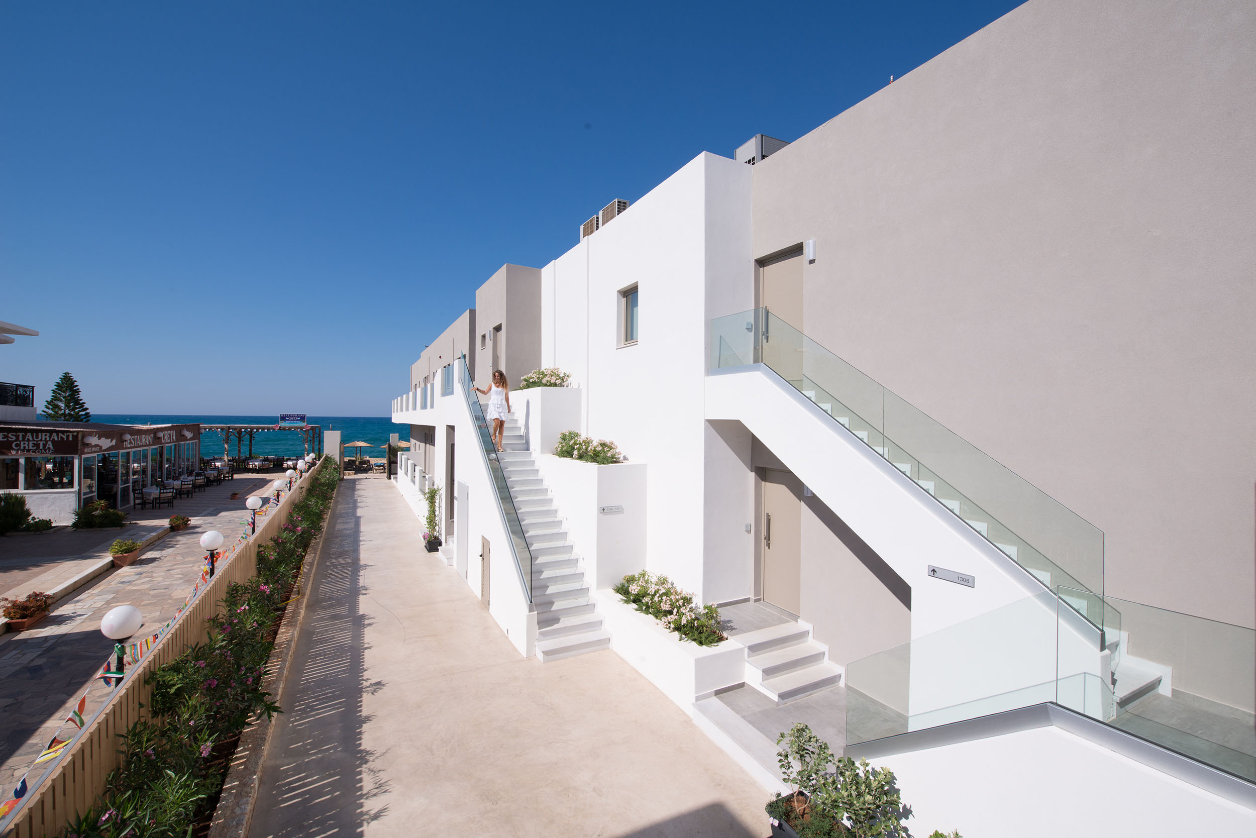 Exterior view of Cactus bay hotel overlooking the sea