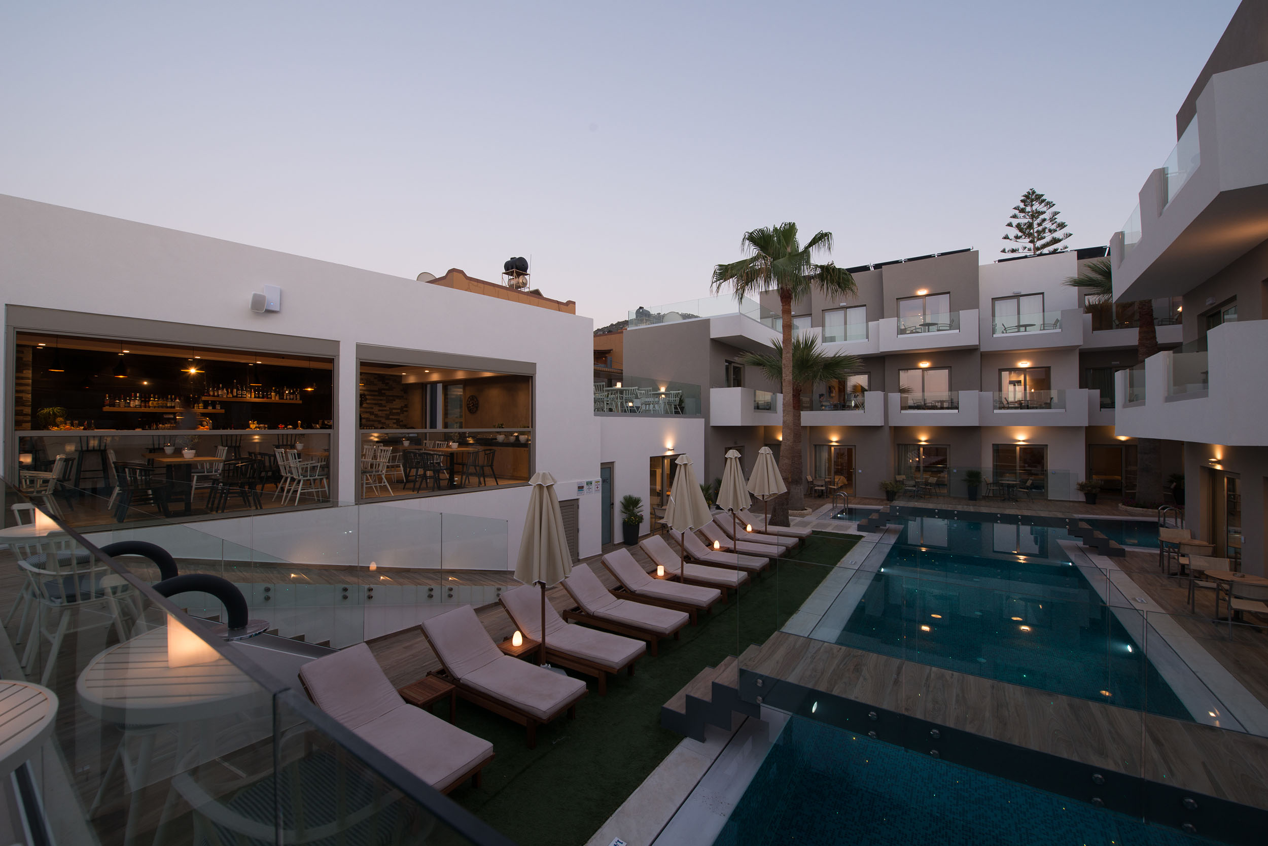 Exterior view of Cactus Bay Hotel rooms, pool bar and rooms