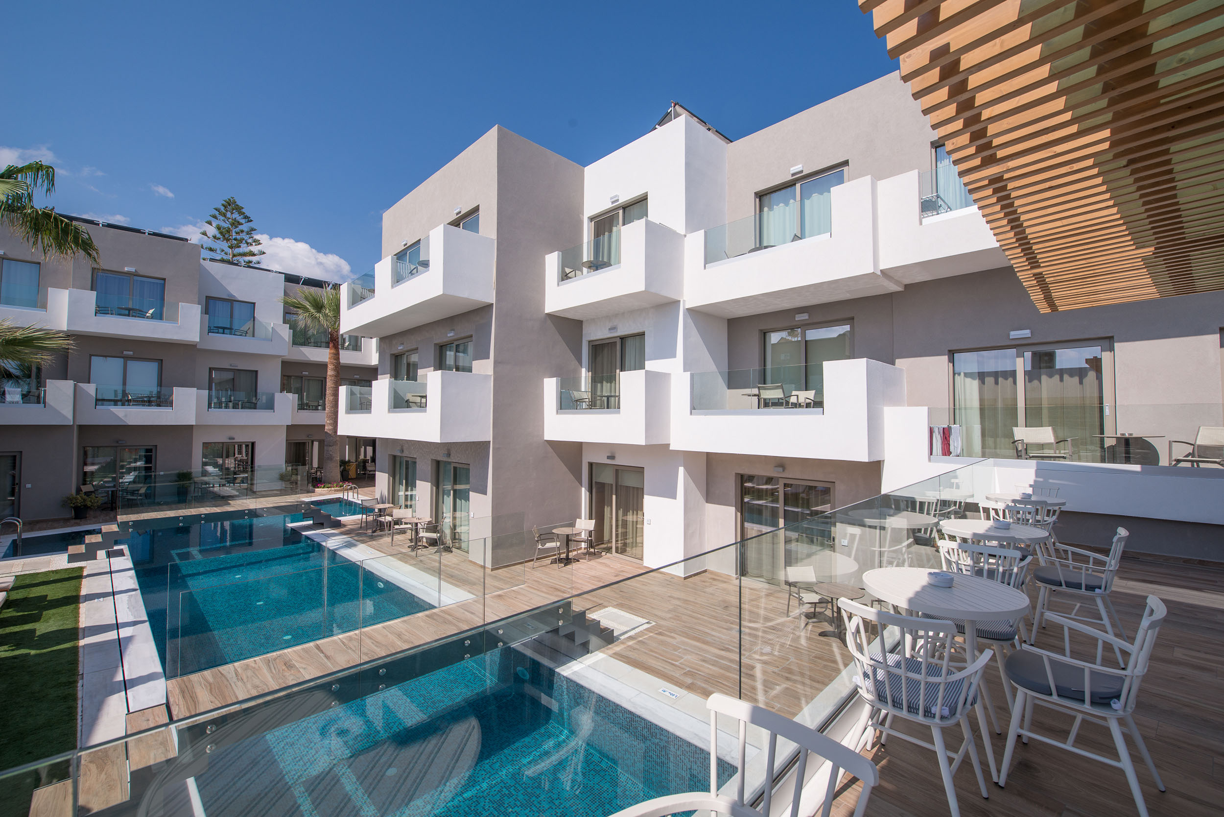 Cafe overlooking the pool and Cactus Bay Hotel