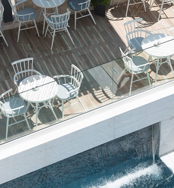 Open cafe overlooking the pool at Cactus Bay Hotel